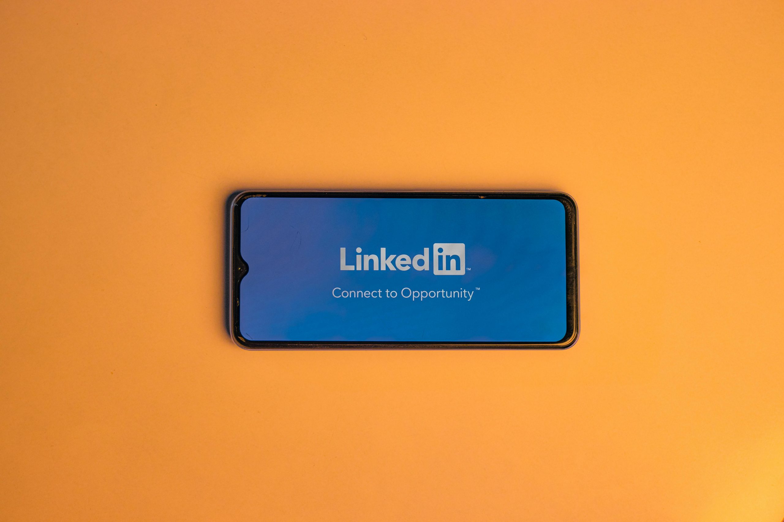 LinkedIn logo on phone screen