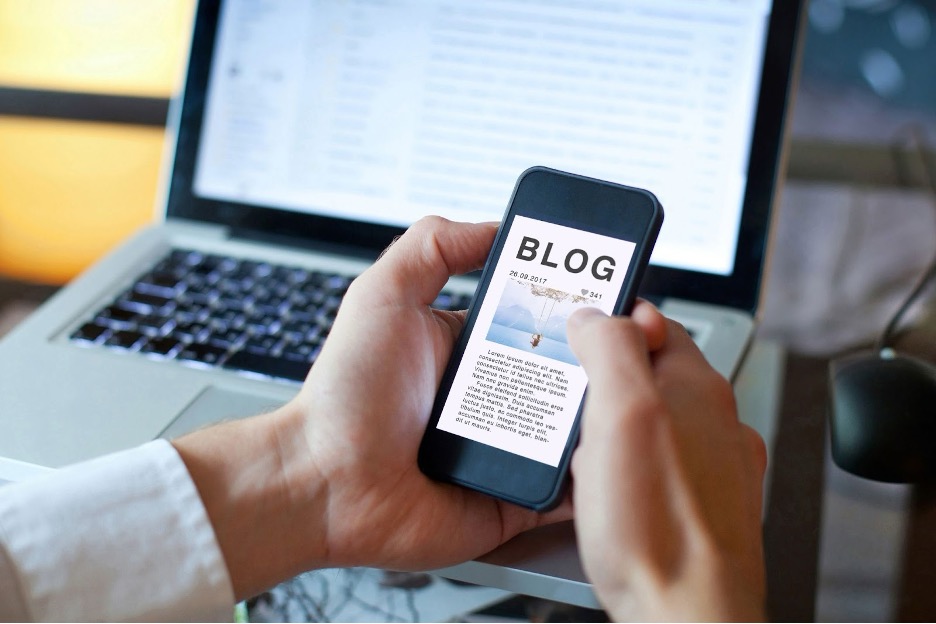 Man with cellphone reading a blog. Concept of blog as part of a marketing strategy.